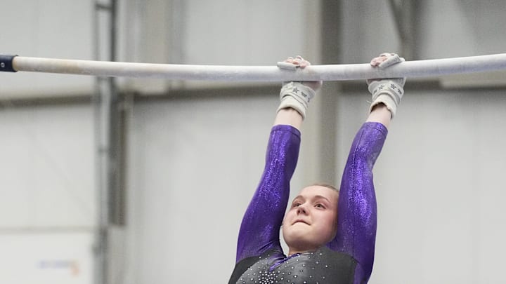 Elkhorn gymnast Kaylee Frank competes on the uneven bars in a WIAA D1 Gymnastics Sectional at Elkhorn High School, Friday, February 28, 2025.