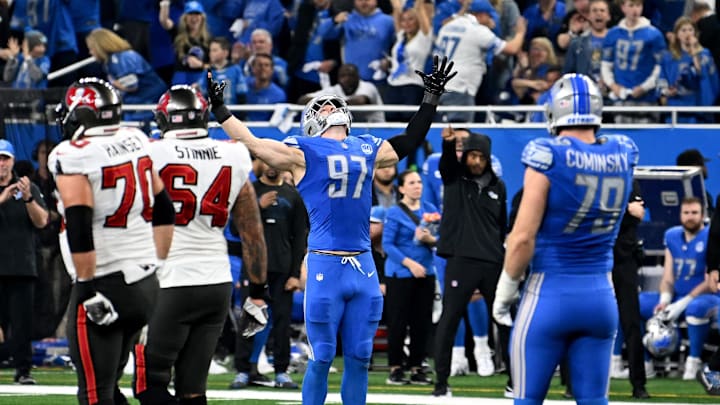 Jan 21, 2024; Detroit, Michigan, USA; Detroit Lions defensive end Aidan Hutchinson (97) reacts after