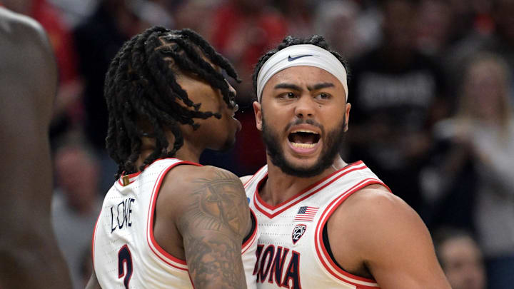 Mar 28, 2024; Los Angeles, CA, USA; Arizona Wildcats guard Kylan Boswell (4) and guard Caleb Love (2) react in the second half against the Clemson Tigers in the semifinals of the West Regional of the 2024 NCAA Tournament at Crypto.com Arena. Mandatory Credit: Jayne Kamin-Oncea-Imagn Images