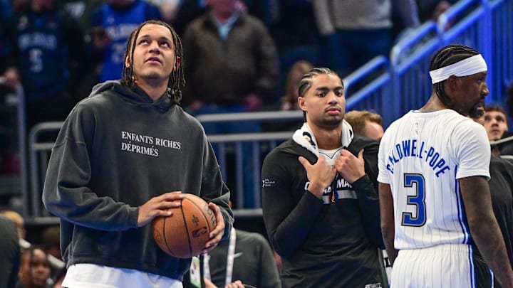 Orlando Magic forward Paolo Banchero looks on from the bench during game against the Milwaukee Bucks.