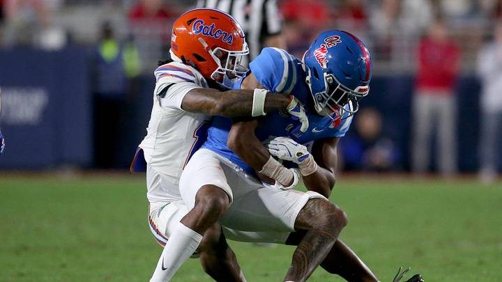 Mississippi Rebels wide receiver De'Zhaun Stribling runs after a catch as Florida Gators defensive back Bryce Thornton makes the tackle Mississippi Rebels wide receiver De'Zhaun Stribling runs after a catch as Florida Gators defensive back Bryce Thornton makes the tackle