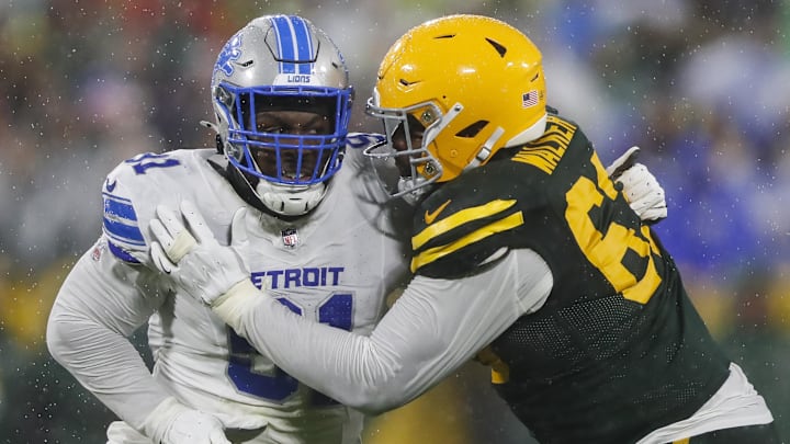 Detroit Lions defensive end Levi Onwuzurike (91) rushes against Green Bay Packers offensive tackle Rasheed Walker.
