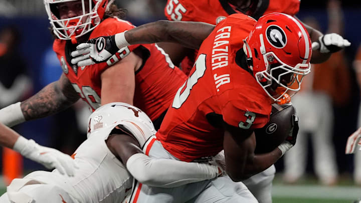 Georgia running back Nate Frazier (3) moves the ball during the first half of the SEC championship game against Texas in Atlanta, on Saturday, Dec. 7, 2024.