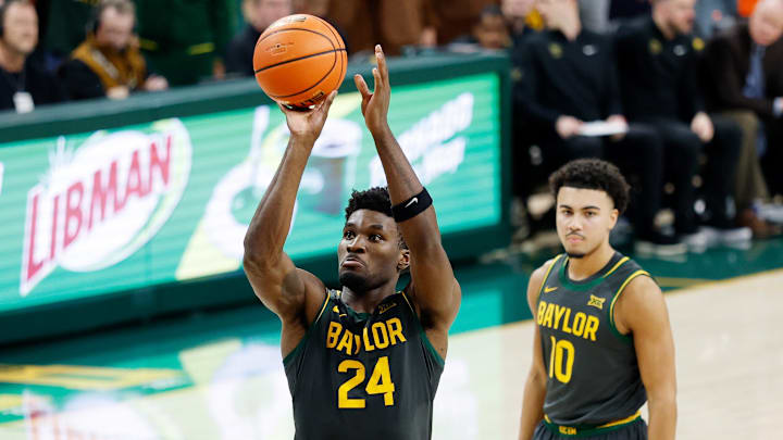 Feb 4, 2026; Waco, Texas, USA;  Baylor Bears guard Tounde Yessoufou (24) shoots a free throw during the second half against the Colorado Buffaloes at Paul and Alejandra Foster Pavilion. Mandatory Credit: Chris Jones-Imagn Images