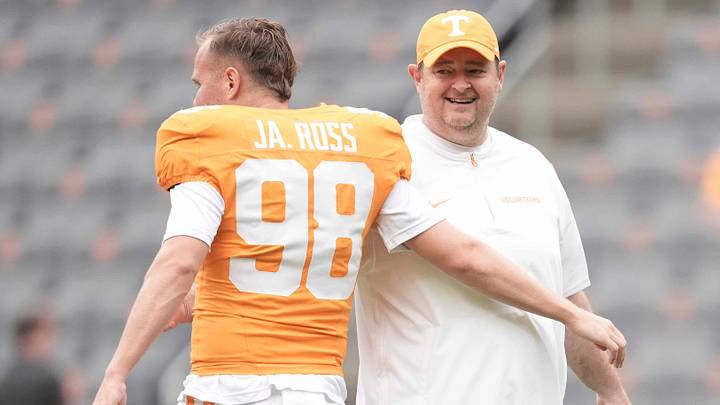 Tennessee head coach Josh Heupel and Tennessee punter Jackson Ross (98) greet each other on the field during a college football game between Tennessee and ETSU at Neyland Stadium in Knoxville, Tennessee, on August 30, 2025. Tennessee head coach Josh Heupel and Tennessee punter Jackson Ross (98) greet each other on the field during a college football game between Tennessee and ETSU at Neyland Stadium in Knoxville, Tennessee, on August 30, 2025.