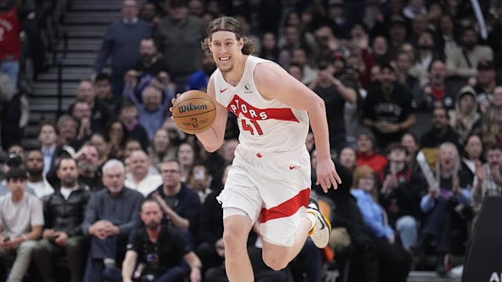 Feb 4, 2025; Toronto, Ontario, CAN; Toronto Raptors forward Kelly Olynyk (41) dribbles the ball against the New York Knicks during the second half at Scotiabank Arena. Mandatory Credit: John E. Sokolowski-Imagn Images