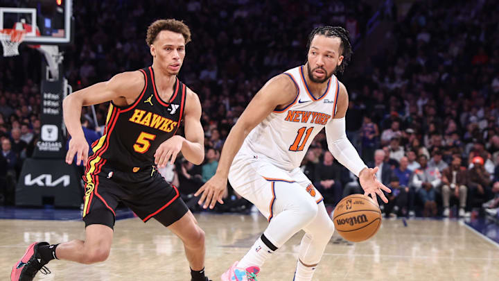 Feb 12, 2025; New York, New York, USA; New York Knicks guard Jalen Brunson (11) looks to drive past Atlanta Hawks guard Dyson Daniels (5) in the second quarter at Madison Square Garden. Mandatory Credit: Wendell Cruz-Imagn Images