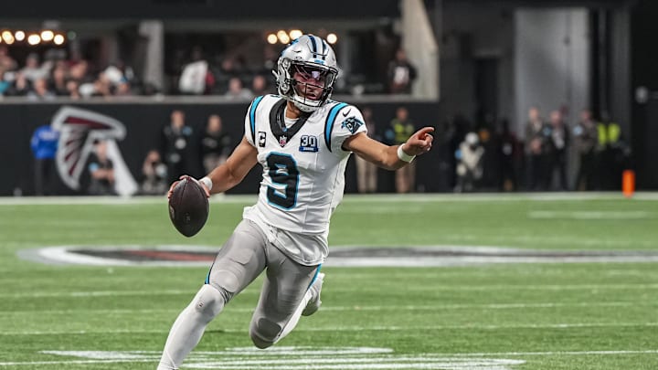 Jan 5, 2025; Atlanta, Georgia, USA; Carolina Panthers quarterback Bryce Young (9) runs for a touchdown against the Atlanta Falcons during the second half at Mercedes-Benz Stadium. Mandatory Credit: Dale Zanine-Imagn Images