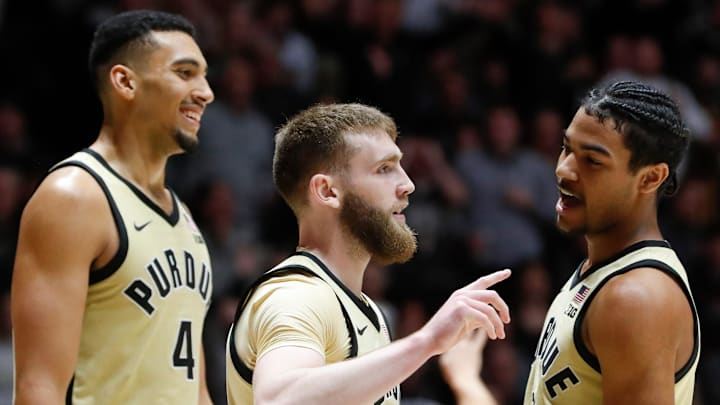 Purdue Boilermakers forward Trey Kaufman-Renn (4), guard Braden Smith (3) and guard C.J. Cox (0) 