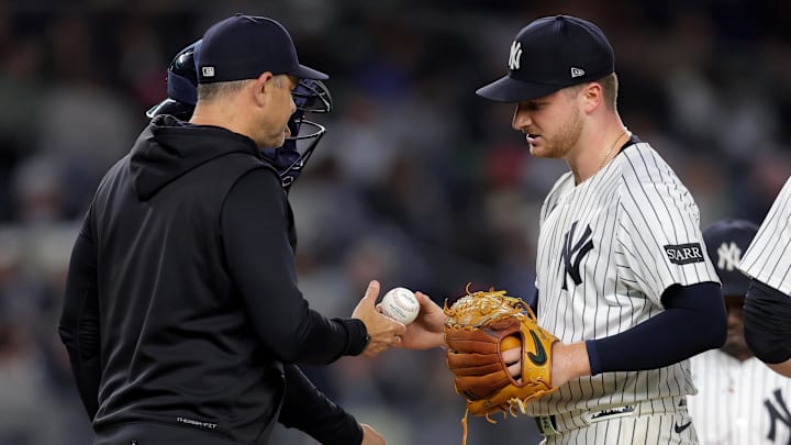 Jun 16, 2025; Bronx, New York, USA; New York Yankees starting pitcher Clarke Schmidt (36) is taken out of the game by manager Aaron Boone (17) during the eighth inning against the Los Angeles Angels at Yankee Stadium. Mandatory Credit: Brad Penner-Imagn Images Jun 16, 2025; Bronx, New York, USA; New York Yankees starting pitcher Clarke Schmidt (36) is taken out of the game by manager Aaron Boone (17) during the eighth inning against the Los Angeles Angels at Yankee Stadium. Mandatory Credit: Brad Penner-Imagn Images