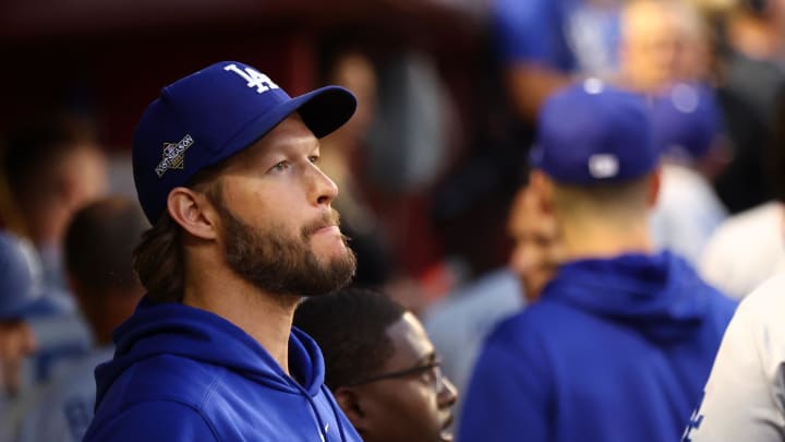 Oct 11, 2023; Phoenix, Arizona, USA; Los Angeles Dodgers starting pitcher Clayton Kershaw (22) in the dug out before during three of the NLDS for the 2023 MLB playoffs against the Arizona Diamondbacks at Chase Field. Mandatory Credit: Mark J. Rebilas-USA TODAY Sports