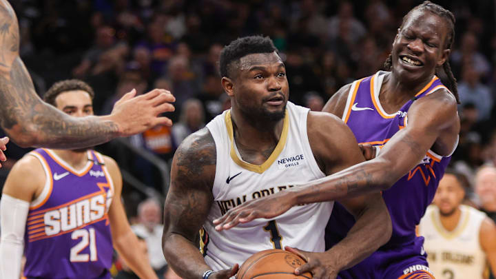 Feb 27, 2025; Phoenix, Arizona, USA; New Orleans Pelicans forward Zion Williamson (1) drives on Phoenix Suns center Bol Bol (11) in the second quarter at Footprint Center. Mandatory Credit: Brett Davis-Imagn Images