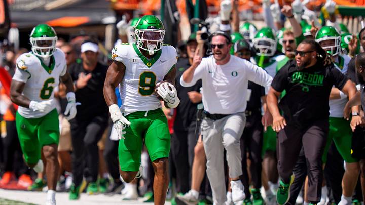 Oregon inside linebacker Devon Jackson scores off a pick-six as the Oregon Ducks face the Oklahoma State Cowboys on Sept. 12, 2026, at Boone Pickens Stadium in Stillwater, Oklahoma.