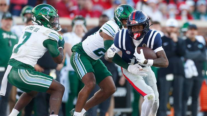 Dec 20, 2025; Oxford, MS, USA; Mississippi Rebels wide receiver Deuce Alexander (11) runs after the catch as Tulane Green Wave defensive back Jahiem Johnson (20) defends during the first half of a game at Vaught-Hemingway Stadium. Mandatory Credit: Petre Thomas-Imagn Images Dec 20, 2025; Oxford, MS, USA; Mississippi Rebels wide receiver Deuce Alexander (11) runs after the catch as Tulane Green Wave defensive back Jahiem Johnson (20) defends during the first half of a game at Vaught-Hemingway Stadium. Mandatory Credit: Petre Thomas-Imagn Images
