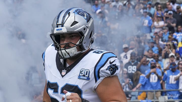 Sep 15, 2024; Charlotte, North Carolina, USA; Carolina Panthers center Austin Corbett (63) takes the field against the Los Angeles Chargers during the first quarter at Bank of America Stadium.