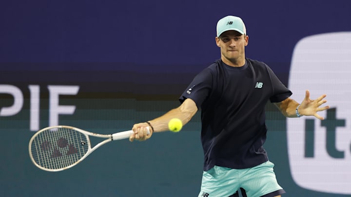 Tommy Paul hits a forehand
