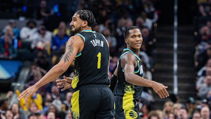 Feb 28, 2024; Indianapolis, Indiana, USA; Indiana Pacers forward Obi Toppin (1) and guard Bennedict Mathurin (00) celebrate a made basket in the second half against the New Orleans Pelicans at Gainbridge Fieldhouse. Mandatory Credit: Trevor Ruszkowski-Imagn Images Feb 28, 2024; Indianapolis, Indiana, USA; Indiana Pacers forward Obi Toppin (1) and guard Bennedict Mathurin (00) celebrate a made basket in the second half against the New Orleans Pelicans at Gainbridge Fieldhouse. Mandatory Credit: Trevor Ruszkowski-Imagn Images