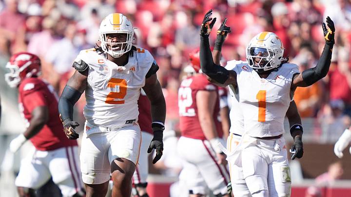 Tennessee defensive back TJ Metcalf (1) celebrates with defensive lineman Xavier Gilliam (2) after Gilliam sacked Arkansas quarterback KJ Jackson (7) during a college football game at Donald W. Reynolds Razorback Stadium in Fayetteville, Ark., on Oct. 10, 2026.