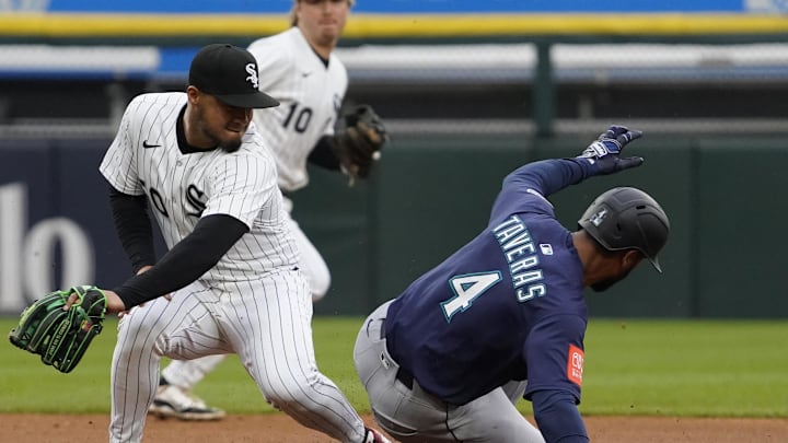 Seattle Mariners outfielder Leody Taveras (4) steals second base as Chicago White Sox second base Lenyn Sosa (50) makes a late tag during the sixth inning at Rate Field on May 21.