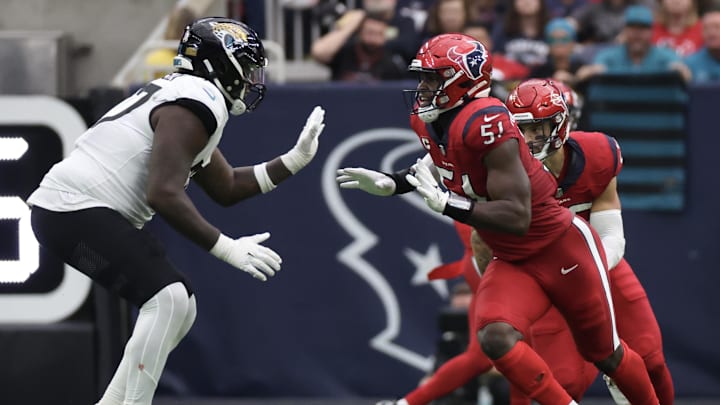 Nov 26, 2023; Houston, Texas, USA; Houston Texans defensive end Will Anderson Jr. (51) is blocked by Jacksonville Jaguars offensive tackle Anton Harrison (77) in the second half at NRG Stadium. Mandatory Credit: Thomas Shea-Imagn Images