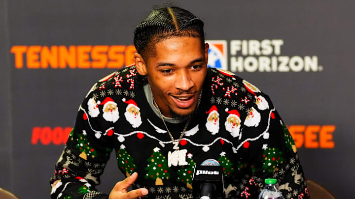 Tennessee guard Zakai Zeigler (5) wears a Christmas sweater during the postgame press conference after a college basketball game between Tennessee and MTSU held at Thompson-Boling Arena at Food City Center in Knoxville, Tenn., on Monday, Dec. 23, 2024.