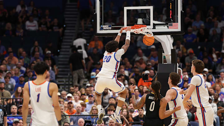 Mar 20, 2026; Tampa, FL, USA; Florida Gators guard Isaiah Brown (20) dunks the ball in the first half against the Prairie View A&M Panthers during a first round game of the men's 2026 NCAA Tournament at Benchmark International Arena. Mandatory Credit: Matt Pendleton-Imagn Images