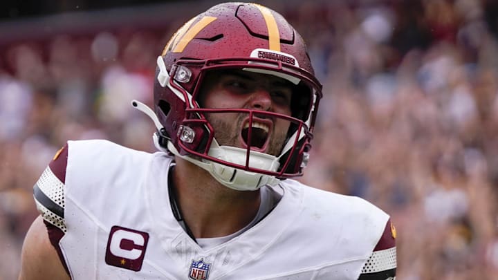 Sep 10, 2023; Landover, Maryland, USA; Washington Commanders quarterback Sam Howell (14) reacts