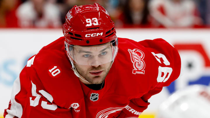 Jan 12, 2026; Detroit, Michigan, USA;  Detroit Red Wings right wing Alex DeBrincat (93) gets set during a face off against the Carolina Hurricanes at Little Caesars Arena. Mandatory Credit: Rick Osentoski-Imagn Images
