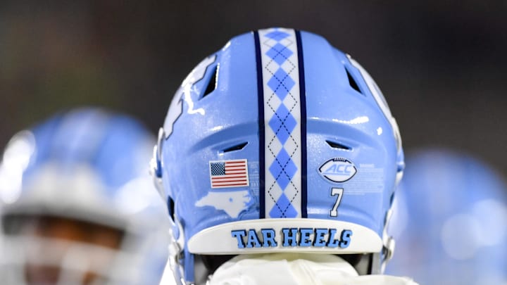 Oct 30, 2021; South Bend, Indiana, USA; A detail view of a North Carolina Tar Heels football helmet during warmups before the game against the Notre Dame Fighting Irish at Notre Dame Stadium. 