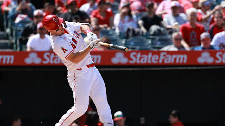 Apr 24, 2024; Anaheim, California, USA;  Los Angeles Angels designated hitter Mike Trout (27) hits a home run during the sixth inning against the Baltimore Orioles at Angel Stadium. Mandatory Credit: Kiyoshi Mio-Imagn Images