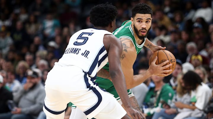 Nov 19, 2023; Memphis, Tennessee, USA; Boston Celtics forward Jayson Tatum (0) handles the ball as Memphis Grizzlies guard Vince Williams Jr. (5) defends during the first half at FedExForum. Mandatory Credit: Petre Thomas-Imagn Images Nov 19, 2023; Memphis, Tennessee, USA; Boston Celtics forward Jayson Tatum (0) handles the ball as Memphis Grizzlies guard Vince Williams Jr. (5) defends during the first half at FedExForum. Mandatory Credit: Petre Thomas-Imagn Images