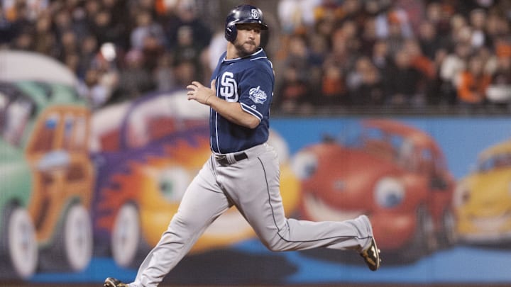 Jun 23, 2015; San Francisco, CA, USA; San Diego Padres first baseman Yonder Alonso (23) advances to third base on a single by third baseman Will Middlebrooks (11, not pictured) during the eighth inning at AT&T Park. Mandatory Credit: Ed Szczepanski-Imagn Images