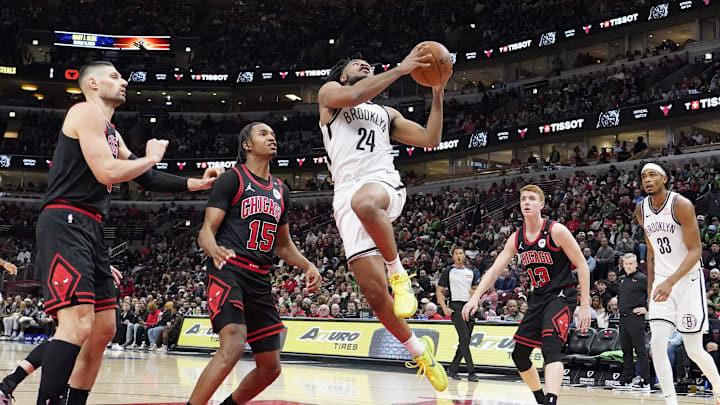 Mar 13, 2025; Chicago, Illinois, USA; Chicago Bulls forward Julian Phillips (15) defends Brooklyn Nets guard Cam Thomas (24) during the second half at United Center. Mandatory Credit: David Banks-Imagn Images Mar 13, 2025; Chicago, Illinois, USA; Chicago Bulls forward Julian Phillips (15) defends Brooklyn Nets guard Cam Thomas (24) during the second half at United Center. Mandatory Credit: David Banks-Imagn Images