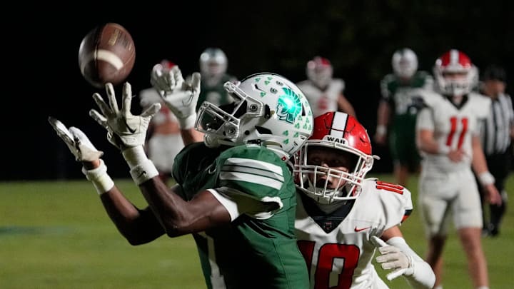Athens Academy's Keyon Standifer (1) pulls in a pass from Athens Academy's Hampton Johnson (7) during a GHSA high school football game against Rabun County in Athens, Ga., on Friday, Oct. 25, 2024.