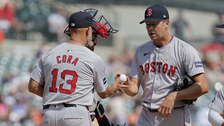 Sep 1, 2024; Detroit, Michigan, USA;  Boston Red Sox manager Alex Cora (13) take the ball to relieve Boston Red Sox pitcher Rich Hill (44) at Comerica Park. Mandatory Credit: Rick Osentoski-Imagn Images