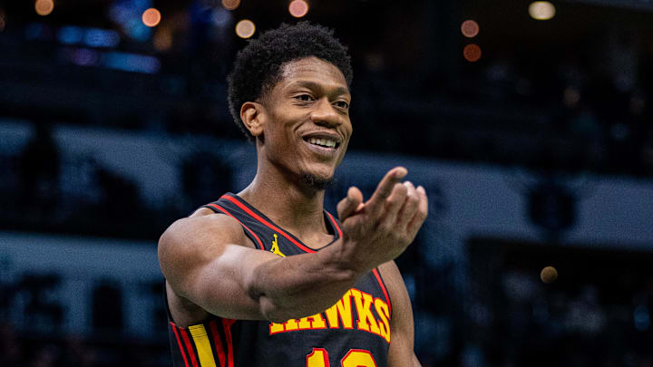 Atlanta Hawks forward De'Andre Hunter (12) reacts after a foul call during the fourth quarter against the Charlotte Hornets at Spectrum Center. November 30, 2024. Atlanta Hawks forward De'Andre Hunter (12) reacts after a foul call during the fourth quarter against the Charlotte Hornets at Spectrum Center. November 30, 2024.