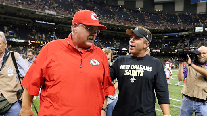 Aug 9, 2013; New Orleans, LA, USA; Kansas City Chiefs head coach Andy Reid, left, and New Orleans Saints head coach Sean Payton talk after the Saints defeated the Chiefs, 17-13, at the Mercedes-Benz Superdome. Mandatory Credit: Chuck Cook-Imagn Images