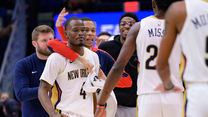 Jan 15, 2025; New Orleans, Louisiana, USA; New Orleans Pelicans guard Jordan Hawkins hugs guard Javonte Green (4) after he made a three point basket late in the fourth quarter against the Dallas Mavericks at Smoothie King Center. Mandatory Credit: Matthew Hinton-Imagn Images