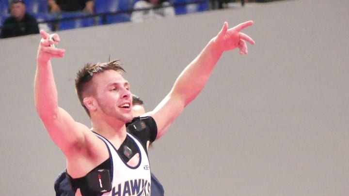 La Pine senior Devon Kerr was one of four wrestlers to complete their mission of becoming four-time state champions Friday night at the Oregon (OSAA) wrestling state tournament.