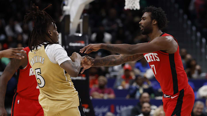 Mar 2, 2026; Washington, District of Columbia, USA; Houston Rockets forward Tari Eason (17) shoves Washington Wizards guard Jamir Watkins (5) in the second half at Capital One Arena. Mandatory Credit: Geoff Burke-Imagn Images