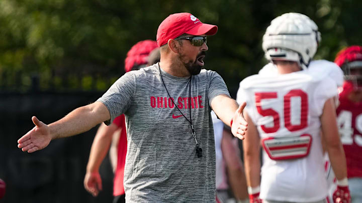 Aug 8, 2024; Columbus, Ohio, USA; Ohio State Buckeyes head coach Ryan Day motions to his team during football practice at the Woody Hayes Athletic Complex.