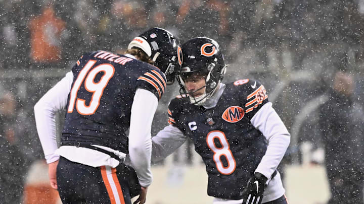 Jan 18, 2026; Chicago, IL, USA; Chicago Bears placekicker Cairo Santos (8) celebrates with punter Tory Taylor (19) after kicking the extra point for a touchdown scored by wide receiver DJ Moore (not pictured) against the Los Angeles Rams during the first quarter of an NFC Divisional Round game at Soldier Field. Mandatory Credit: Matt Marton-Imagn Images