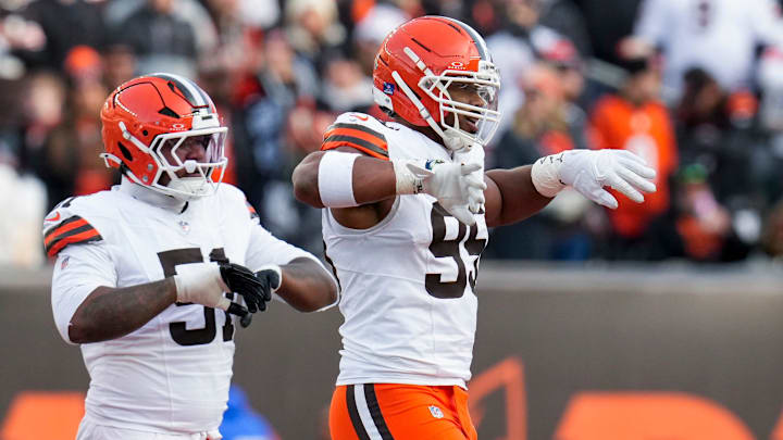 Cleveland Browns defensive end Myles Garrett (95) celebrates as he comes back on the field in the fourth quarter of the NFL Week 18 game between the Cincinnati Bengals and the Cleveland Browns at Paycor Stadium in Downtown Cincinnati on Sunday, Jan. 4, 2026. The Browns kicked a last second field goal to win 20-18.