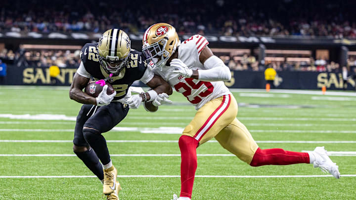 Sep 14, 2025; New Orleans, Louisiana, USA; New Orleans Saints wide receiver Rashid Shaheed (22) scores a touchdown against San Francisco 49ers safety Jason Pinnock (25) during the second half at Caesars Superdome. Mandatory Credit: Stephen Lew-Imagn Images Sep 14, 2025; New Orleans, Louisiana, USA; New Orleans Saints wide receiver Rashid Shaheed (22) scores a touchdown against San Francisco 49ers safety Jason Pinnock (25) during the second half at Caesars Superdome. Mandatory Credit: Stephen Lew-Imagn Images