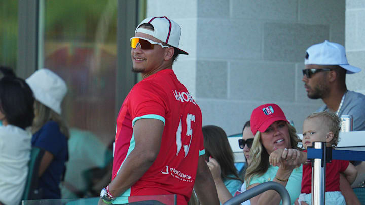Jun 9, 2024; Kansas City, Missouri, USA; Kansas City Chiefs Quarterback Patrick Mahomes reacts in the first half between Kansas City Current and Seattle Reign FC at CPKC Stadium. Mandatory Credit: Jay Biggerstaff-USA TODAY Sports
