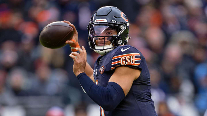 Dec 10, 2023; Chicago, Illinois, USA;  Chicago Bears quarterback Justin Fields (1) passes against the Detroit Lions at Soldier Field. Mandatory Credit: Jamie Sabau-USA TODAY Sports