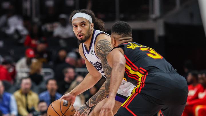 Mar 28, 2026; Atlanta, Georgia, USA; Sacramento Kings guard Devin Carter (22) looks for a play against Atlanta Hawks guard CJ McCollum (3) during the first quarter at State Farm Arena. Mandatory Credit: Jordan Godfree-Imagn Images
