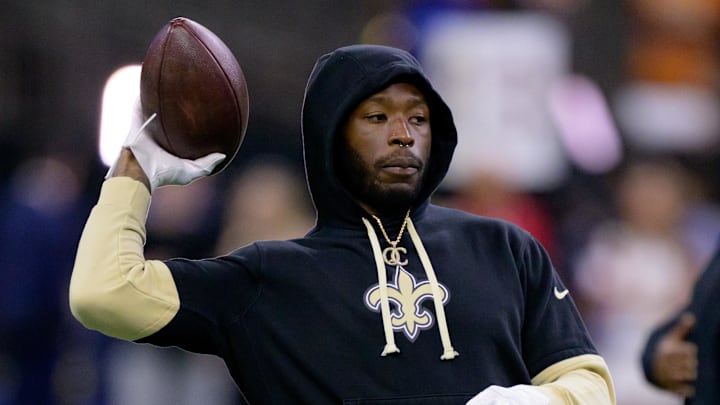 Oct 13, 2024; New Orleans, Louisiana, USA; New Orleans Saints running back Alvin Kamara warms up before a game against the Tampa Bay Buccaneers at Caesars Superdome. Mandatory Credit: Matthew Hinton-Imagn Images