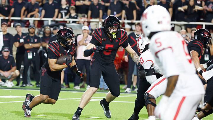 Texas Tech RB Cameron Dickey rushes against Houston in the second half at Galaxy Stadium. Mandatory Credit: Michael C. Johnson-Imagn Images