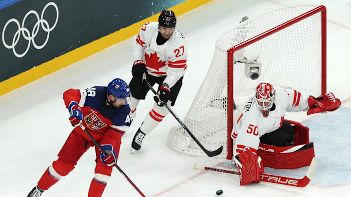 [US, Mexico & Canada customers only] Feb 12, 2026; Milan, Italy; Tomas Hertl of Czech Republic in action with Jordan Binnington and Shea Theodore of Canada  in a men's ice hockey Group A match during the Milano Cortina 2026 Olympic Winter Games at Milano Santagiulia Ice Hockey Arena. Mandatory Credit: Mike Segar/Reuters via Imagn Images